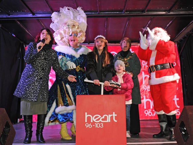 The Cascades Shopping Centre in Commercial Road, Portsmouth, when they turned on their Christmas lights back in 2013.  Pictured is: (l-r) Zoe Hanson from Heart Breakfast, Christopher Marlowe playing Queen Gertie the Gorgeous, Daniella Westbrook playing Fairy Sparkle in the Kings Theatre Christmas Panto Sleeping Beauty, The Lord Mayor of Portsmouth Cllr. Lynne Stagg and her granddaughter Willow Kilty (6) and Father Christmas turning on the lights. Picture: Sarah Standing (133202-8958)