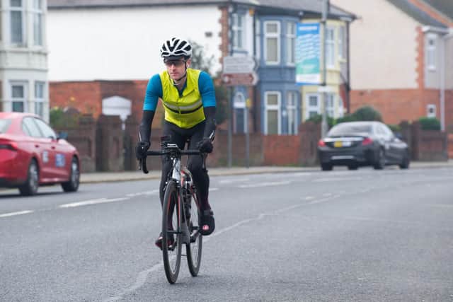 Close pass operation being held at Alexander Way, Portsmouth on 11th November 2021Police are focusing on passing distances between drivers and cyclists.Pictured: Police officer Paul Farquharson on his bike patrolling Northern Parade, PortsmouthPicture: Habibur Rahman