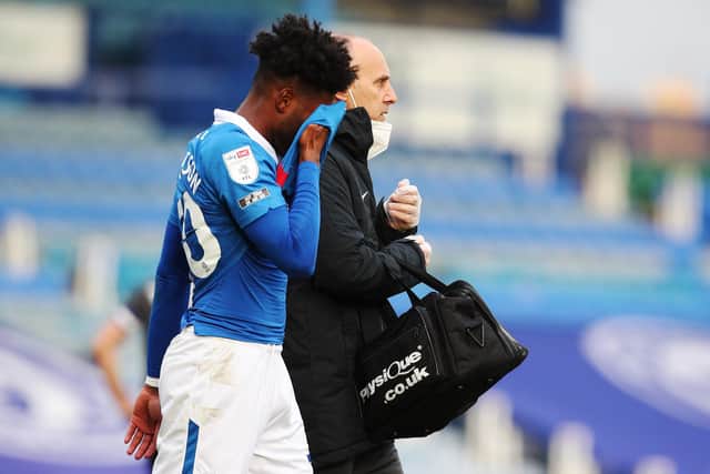 Ellis Harrison leaves the pitch early during Pompey's defeat against Doncaster Rovers