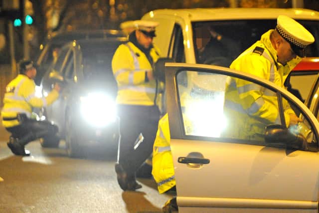 File photo as Hampshire traffic police stopped drivers as they left Portsmouth at the entrance to Unicorn Gate in the city.   Picture Ian Hargreaves  (151954-20)