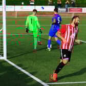 Brett Pitman has just converted one of his two second-half penalties against Fareham. Picture by Ken Walker
