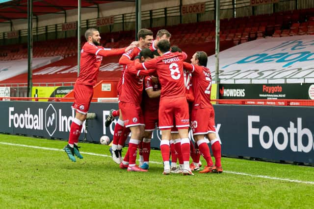 Crawley celebrate one of their goals in the 3-0 FA Cup victory over Leeds. Picture: Jamie Evans