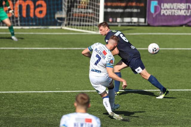 Jake McCarthy curls a shot around Jake Goodman and into the Dover net to make it 3-1. Picture by Dave Haines