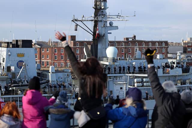 Sailors wave as they sail back into the city. Picture: Royal Navy