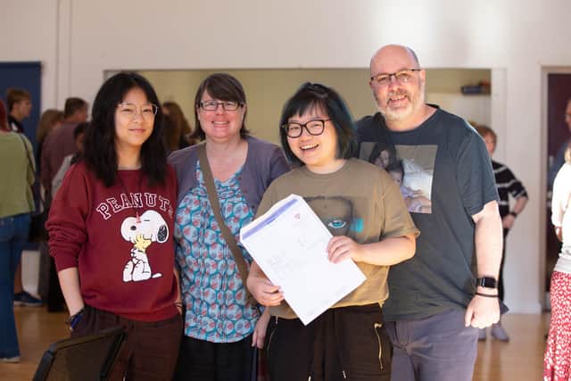 Piper Lane who got two A*s and two As, with sister Inara, mother Debbie, and father Steve. Picture: Habibur Rahman