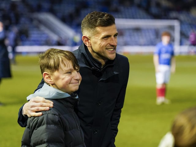 Pompey fans backed their team to a crucial Championship survival win over Cardiff last night.