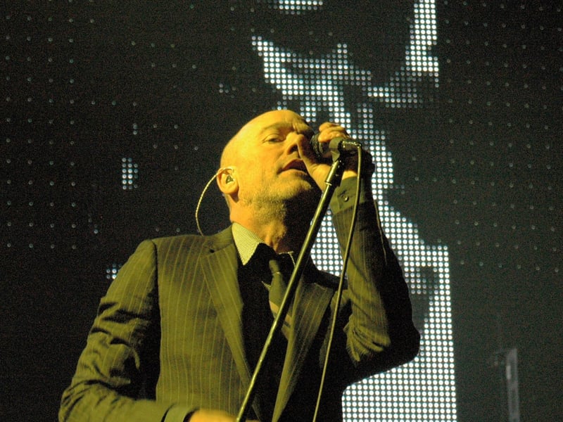 REM performing at The Rose Bowl, West End in August 2008.