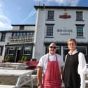 Love Your Local feature on The Bridge Tavern, Old Portsmouth.
Lynn and Dave Reed pictured outside of the pub.
Picture: Stuart Martin (220421-7042)