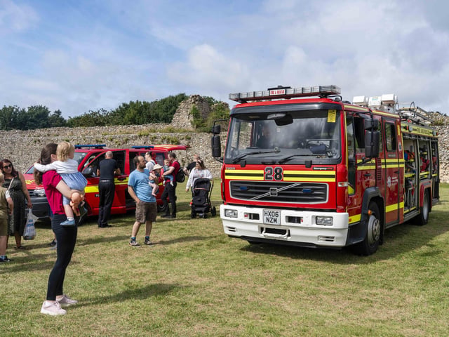 People viewing a Hampshire and Isle of Wight Fire & Rescue appliance at Portchester Gala on August 3.
