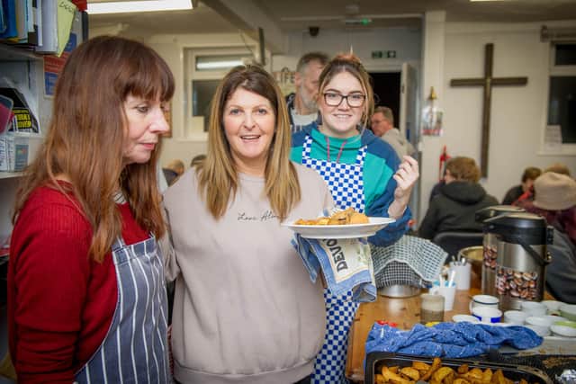 Staff prepare and dish out food on a busy night at The LifeHouse. Picture: Habibur Rahman