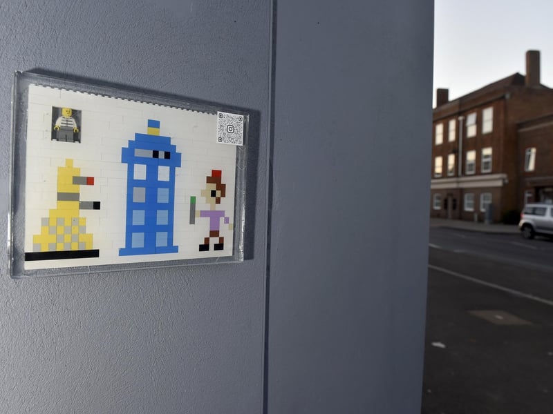 Vanguard Comics in Stoke Road, Gosport, celebrated 60 years of Doctor Who at the shop on Thursday, November 23.
Pictured is: Local artist "Bricksy" created a Doctor Who themed artwork outside Vanguard Comics.
Picture: Sarah Standing (231123-2070)