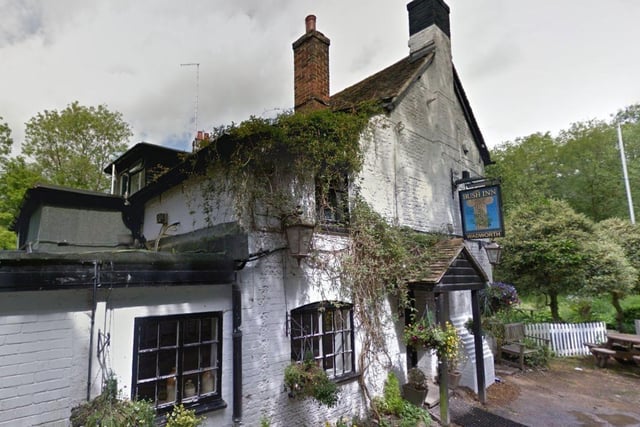 The Bush Inn has a beautiful outdoor seating area that overlooks the river.