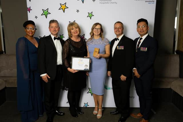 Military Award: LNN Kathryn Jay, Practice Development Nurse, with team and Liz Rix. Picture by Marcin Jedrysiak