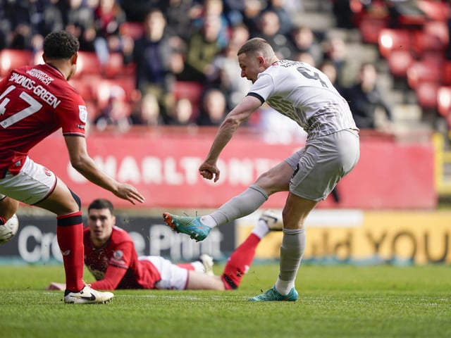 Pompey striker Colby Bishop goes for goal.