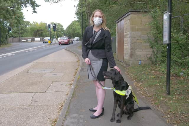 Registered blind journalist Siobhan Meade, 36, with her three-year-old Labrador retriever guide dog, Marty. Picture: Siobhan Meade