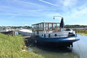 This three-bed houseboat in Bursledon is on the market for £169,950.