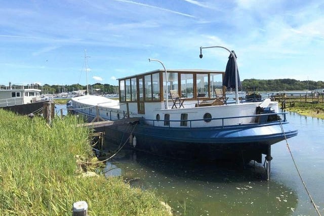 This three-bed houseboat in Bursledon is on the market for £169,950.
