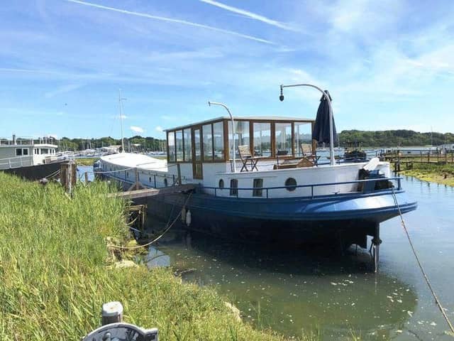 This three-bed houseboat in Bursledon is on the market for £169,950.