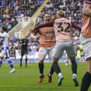 Terry Devlin celebrates with Paddy Lane after scoring the winner at Reading. Picture: Jason Brown