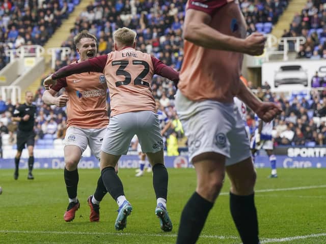 Terry Devlin celebrates with Paddy Lane after scoring the winner at Reading. Picture: Jason Brown