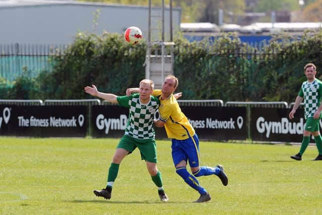 Meon Milton's Barry Jeans, right, and Mob Albion's Joe McIntosh.

Picture: Sarah Standing