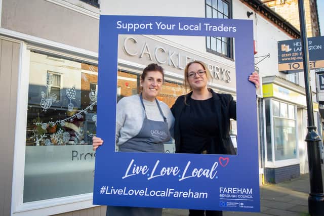 Cackleberry's, Fareham is taking part in the Live Love Local campaign - it has a frame that customers can hold up and get their picture taken with in in order to win £150 and a hamper on Thursday 2nd December 2021

Pictured: Staff member Denise White and manager, Edwina Wain

Picture: Habibur Rahman
