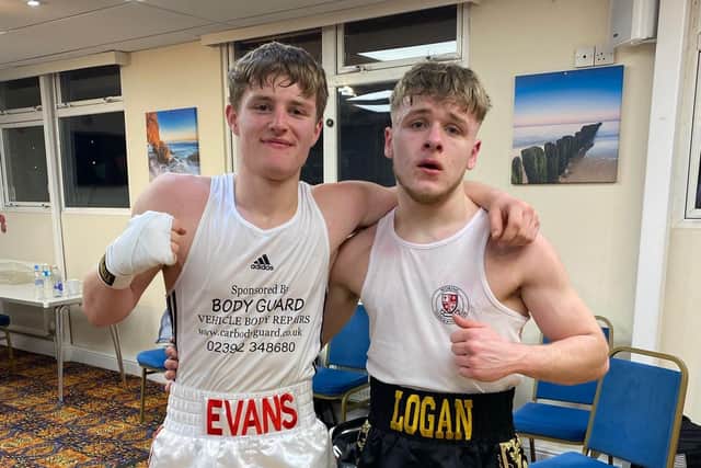 Harry Jones, left, stands proud with the Evans name on the front of his shorts following his unanimous decision amateur debut victory over Woking's Logan Bull