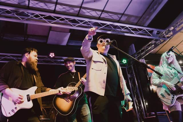 The Lottery Winners with manager/producer Tristan Ivemy (second from left) at Staggeringly Good Brewery, Portsmouth on May 10 2023, Photo by Tony Palmer (@shot_by_tony)