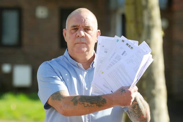 Gary Jeffery, from Paulsgrove, has received parking charge notices from the NCP car park in Crasswell Street in Portsmouth, despite paying for a car parking ticket back in July 2020. 

Picture: Sarah Standing (230221-1537)