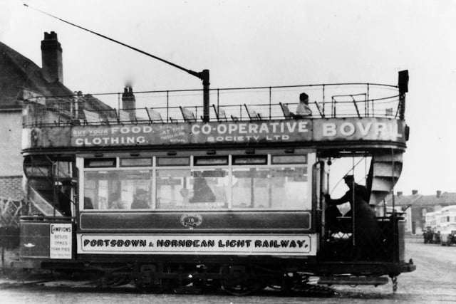 A Tram from Horndean passes over Spur Road, Cosham in the 1930s.Then - A tramcar from Horndean on the Portsdown & Horndean Light Railway passes over Spur Road, Cosham. Picture: Barry Cox collection.