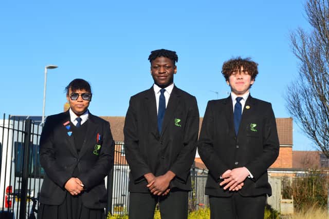 From left, A'layah Parris, Ariel Lusala and Jake Hunter, all Year 11 at Park Community School in Havant. Picture: David George