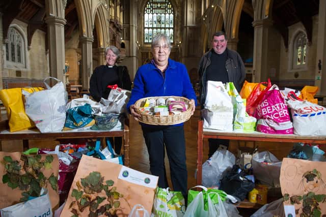 Father Bob and reverend Sam Collins handing over donations to Carole Damper from the Roberts Centre for the Harvest handover at St Mary’s Church, Fratton, Portsmouth on 8 October 2020
Pictured: Reverend Sam Collins with Carole Damper and Father Bob.
Picture: Habibur Rahman