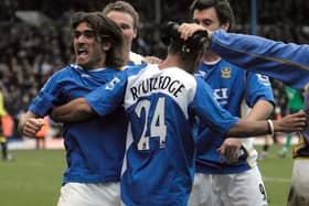 Pedro Mendes, left, celebrates his winner against Manchester City with his Pompey team-mates in March 2006.