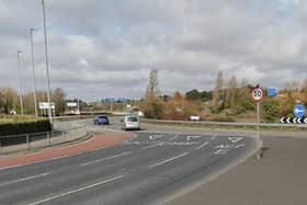 The crash where three people were injured took place near the Portsbridge Roundabout.