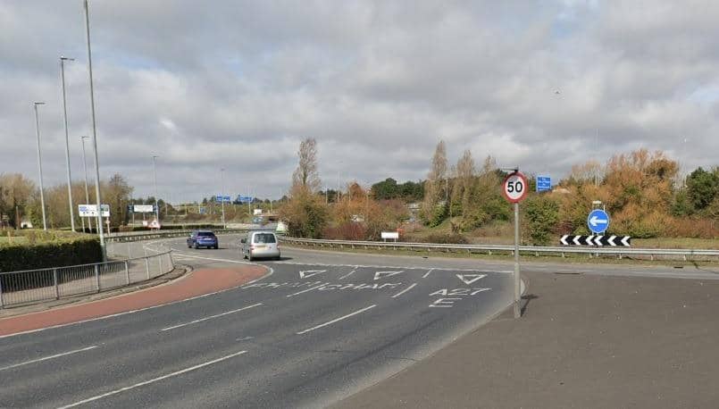 The crash where three people were injured took place near the Portsbridge Roundabout.