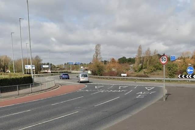 The crash where three people were injured took place near the Portsbridge Roundabout.