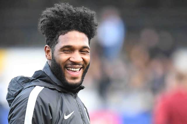 Former Pompey striker Ellis Harrison has joined Port Vale for an undisclosed fee.
