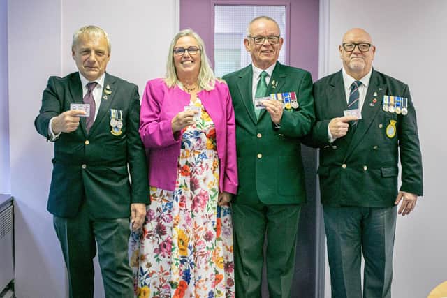 Pictured: Veterans, David Atkinson, Helen Field, David Cussell and David Atkinson with their new ID cards at HMS Sultan, Gosport. Picture: Habibur Rahman