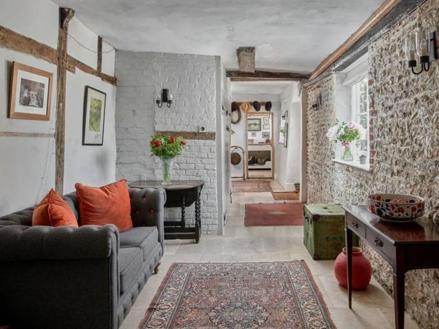 The listing says: "A stunning Grade II* country house with a fabulous contemporary feel, set in an historic rural position close to the village of Hambledon."