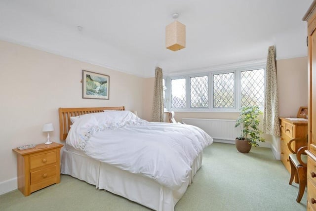 Just one of the many bedrooms that this property has to offer.