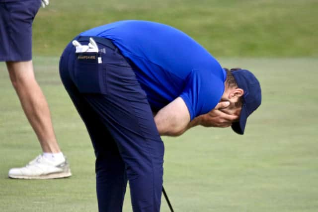 Hayling GC’s Toby Burden can’t believe his putt has stayed up on the 17th in his singles match against Kent.