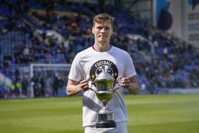 Sean Raggett is ready to hand over the The News/Sports Mail Player of the Season trophy he won for 2021-22. Picture: Jason Brown/ProSportsImages