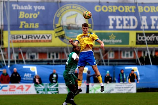 Maxwell Kinsey, right, wins a header for Gosport against Hendon. Picture by Tom Phillips