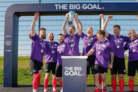 Onecom lifting The Big Goal trophy after winning the Southern Regionals