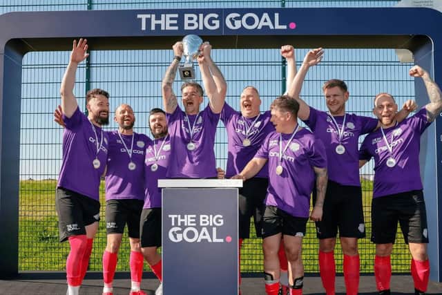 Onecom lifting The Big Goal trophy after winning the Southern Regionals
