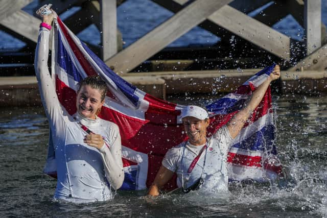 Eilidh McIntyre, left, and Hannah Mills have just been crowned Tokyo Games 470 Class women's Olympic champions. Picture: AP Photo/Bernat Armangue