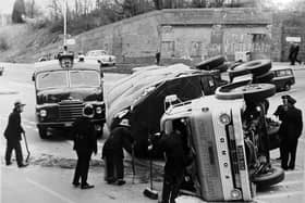 Truck accident Southwick Hill
A lorry that has tipped over at the junction of London Road and Southwick Road, Cosham in 1969.