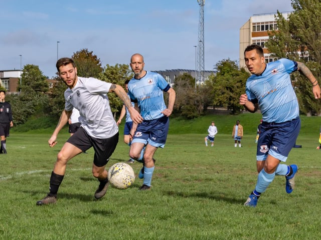 Portchester Rovers (blue) v Pompey Dynamos. Picture: Mike Cooter