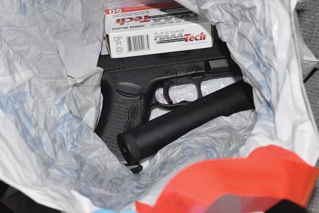 The handgun, silencer and ammunition found in a Tesco bag at the unit in Clamp Farm Stables, pictured on October 2, 2019.
Jurors were shown images at Portsmouth Crown Court where Lee Matthews, James Bakes and Jason Stanley are on trial. Picture: Hampshire police