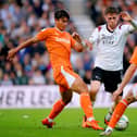 Blackpool claimed a 2-0 victory over Derby County